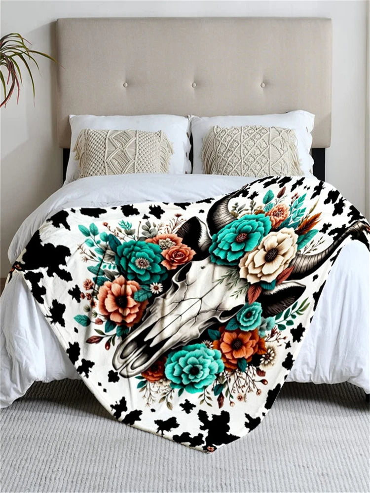 Floral cow skull blanket, black and white with colorful flowers