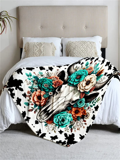 Floral cow skull blanket, black and white with colorful flowers